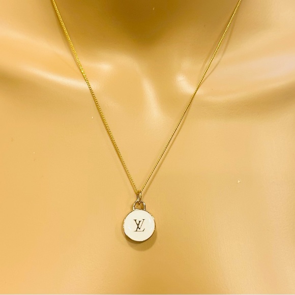 Louis Vuitton Jewelry - ‼️CLEARANCE‼️Gold & White Louis Vuitton Charm On New Women’s 12 Karat